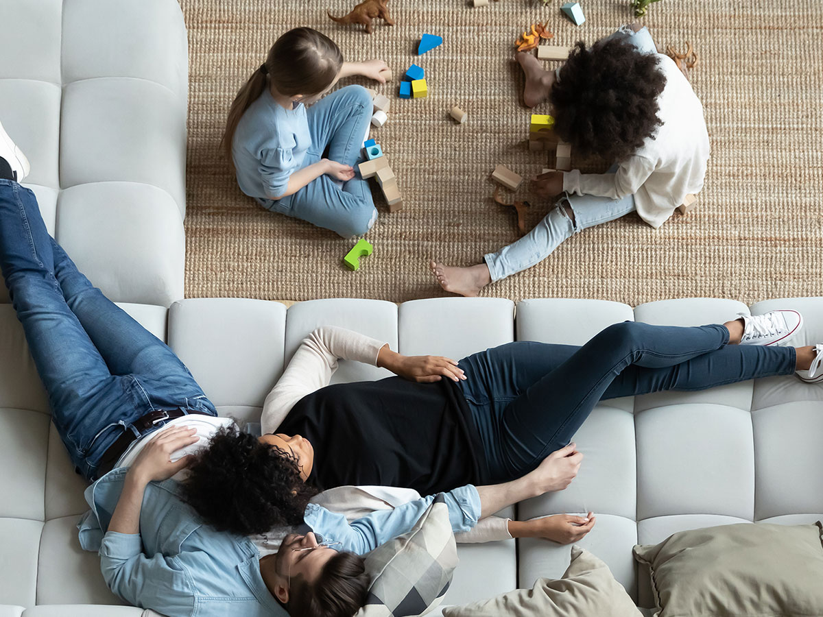 Happy family enjoying the inside of their home