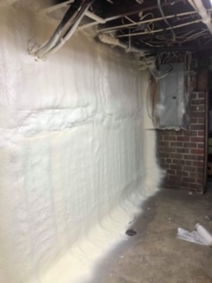 Spray foam insulation on wall