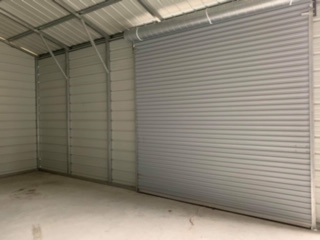 Roll up doors of storage building w/o insulation