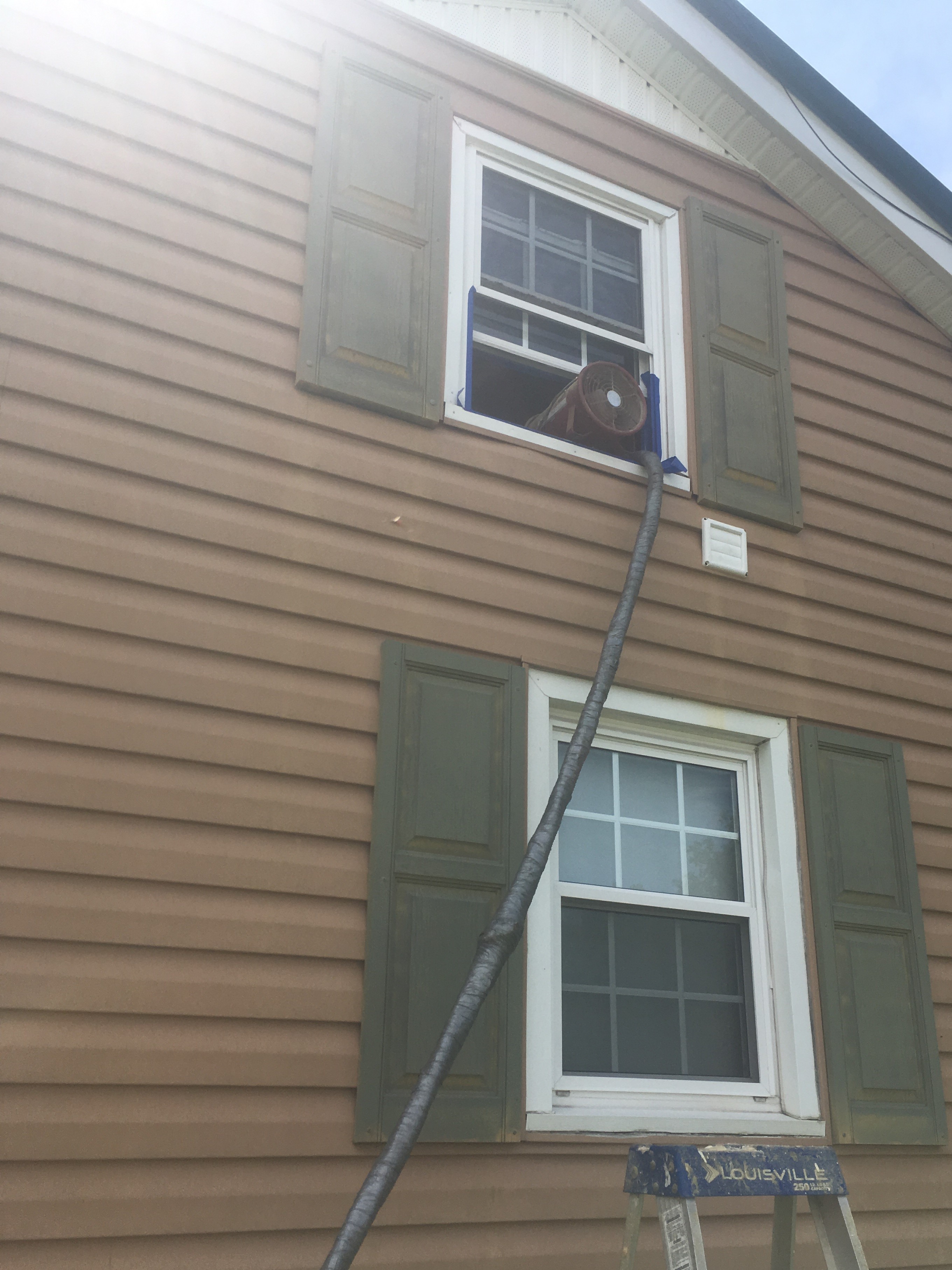 Hose going through second story to attic