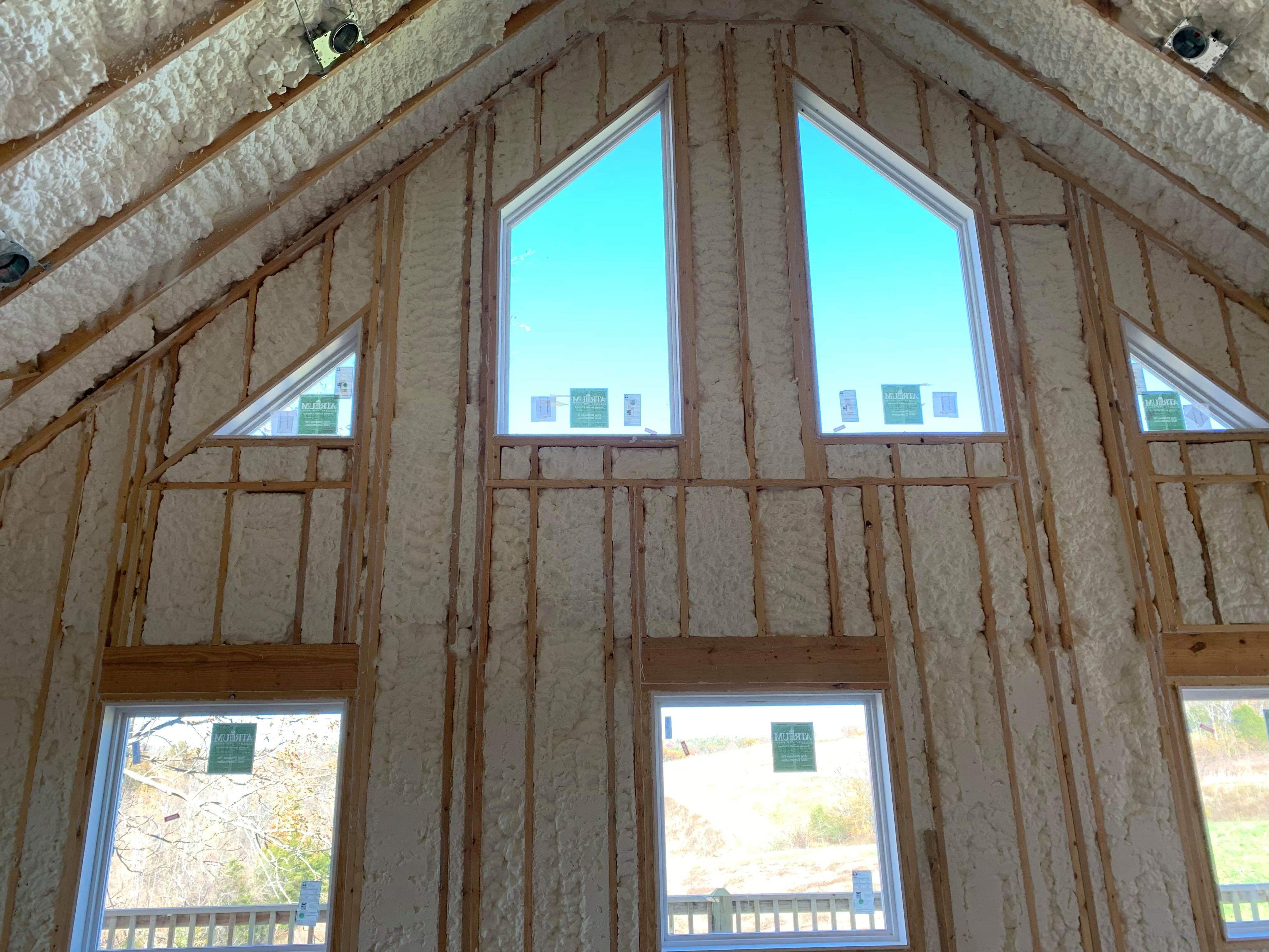 Windows and wall with spray foam insulation